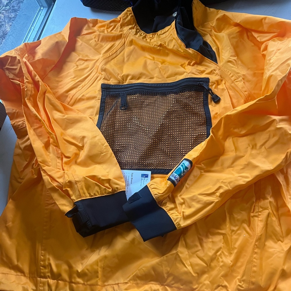 Bright Orange Waterproof jacket for boating, kayaking  with Black Accents